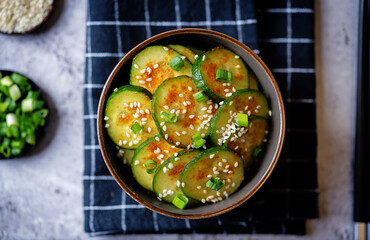 Spicy soy sauce cucumber salad in a bowl