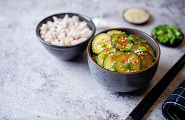 Spicy soy sauce cucumber salad in a bowl