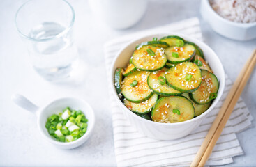 Spicy soy sauce cucumber salad in a bowl