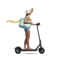 PNG file no background Happy female tourist riding an electric scooter © stokkete
