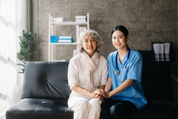 medical doctor holing patient's hands and comforting her.Kind doctor giving real support for patient...