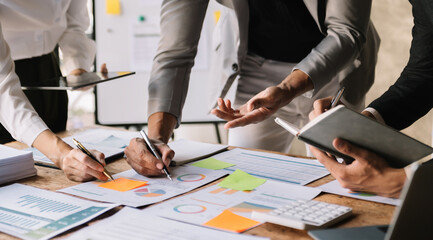 Business team meeting present.professional investor working with Finance managers task. with digital tablet,smartphone and laptop at office.