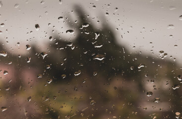 Raindrops behind the window. 