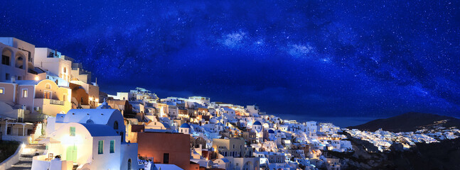  The Milky way galaxy with star in the night at Oia town on Santorini island, Greece
