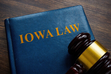 Iowa law book and gavel on the table.