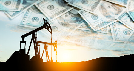Oil price cap concept. Petroleum, petrodollar and crude oil concept. Oil pump on background of US dollars. Dollars and oil pumps