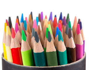 Colored pencils on a white background, isolated. Drawing tools. Children's creativity.