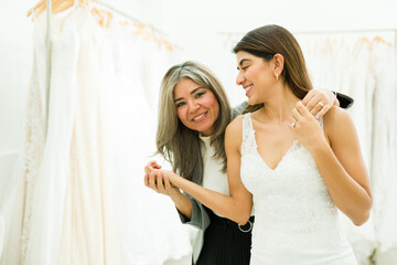 Portrait of mother and young woman at the bridal shop