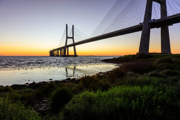 Vasco da Gama bridge at sunrise in a cold November morning: this bridge is simply beautiful, curvy and sexy!