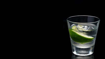 banner Luxury cocktail Vodka lime mojito, gin tonic with ice, tequila in rocks-glass on black...
