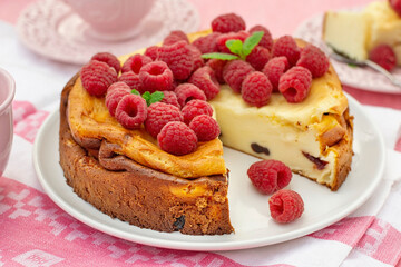 Quark and mascarpone crustless cheesecake served with raspberries