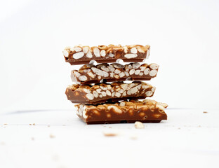 pieces of rice chocolate bar over white background