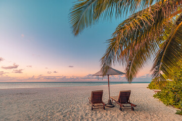 Fantastic beach. Couple chairs sandy beach sea. Luxury summer holiday and vacation resort hotel for tourism. Inspirational tropical landscape. Tranquil scenery, relax beach, beautiful landscape design