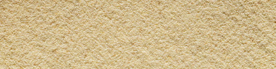 Banner horizontal sandy light smooth background format 4:1 sand macro photography