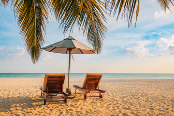 Fantastic beach. Couple chairs sandy beach sea. Luxury summer holiday and vacation resort hotel for tourism. Inspirational tropical landscape. Tranquil scenery, relax beach, beautiful landscape design