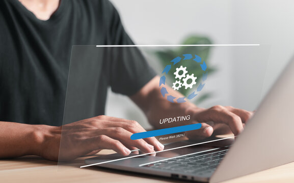 Businessman Working And Installing Update Process. Software Update Or Operating System Upgrade To Keep The Device Up To Date With Added Functionality In New Version And Improve Security.