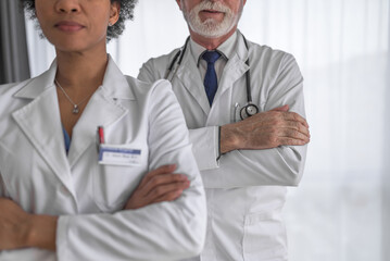 Confident diverse medical staff, working at the clinic.