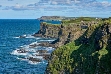 Fototapeta na wymiar Wild cliffs at the Atlantic coastline of Northern Ireland near Ballycastle, Northern Ireland, UK