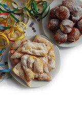 Traditional italian Crostoli ( also called chiacchere, frappe, bugie, cenci, galani) and fritters...