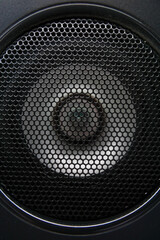 close up shot of metal speaker grill