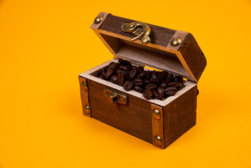 chest with coffee , Image of middle-aged coffee beans. Poured into a pirate chest. Precious,...