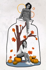 Creative abstract template collage of two charming cute girls enjoy autumn ripe pumpkins sitting glass jar falling leaves tree concept