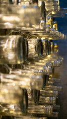 Stacked bottles waiting to be filled