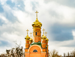 Christian church cross in high steeple tower for prayer