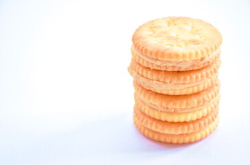 cookie stuffing milk cream arranging on white background