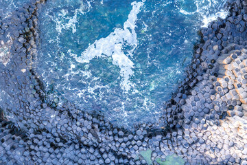 Aerial view with dozen of stones on Giants Causeway, the famous landmark on Northern Ireland UK
