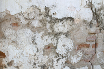 Old wall with concrete cracks, vintage wall background