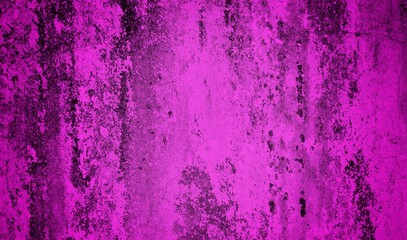 A textured purple concrete wall with a prominent vertical crack. 