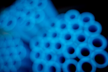 Background of the blue plastic pipes in stacked