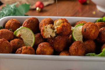 Codfish ball. cod croquette with potato is a traditional Portuguese dish. in Brazil called bolinho...