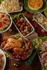 Christmas dinner. With roast turkey and foods served in Brazil. Traditional Christmas table served in Brazil, decorated. Family dinner. top view