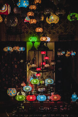 Traditional arabic lamps for sale at the night arabic market.Mosaic Ottoman lamp.hanging lanterns inside the Grand Bazaar