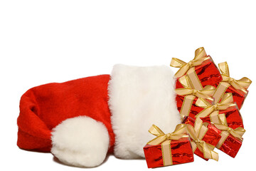 Red santa claus hat isolated on white background. Red gift boxes.
