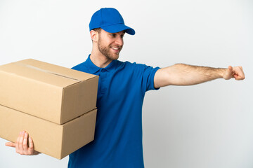 Delivery man over isolated white background giving a thumbs up gesture