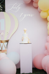 first birthday pink cake with decorations for cake smash