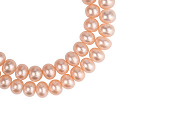 two strings of natural pink pearls, beads, isolate on a black background