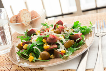 fresh vegetarian healthy vegetable salad with arugula