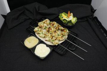 Chicken Tikka Yogurt on black background