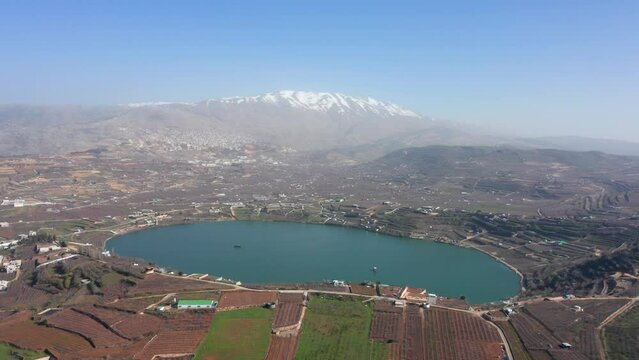 Ram Lake and snowy mount Hermon in Northern Israel, Drone footage