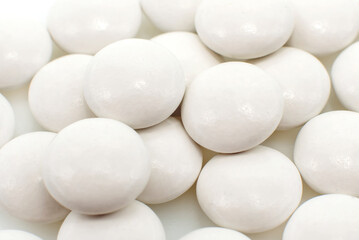 Medical tablet on a white background close-up. Vitamins isolate