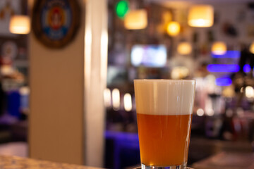 cold beer mug on a bar counter