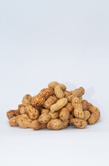 Fototapeta na wymiar Pile of peanuts. Isolated on white background
