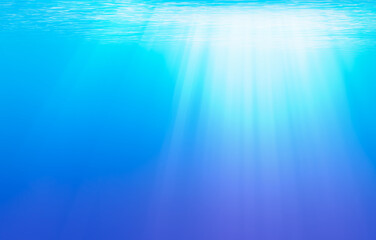 Blue deep sea underwater background with sun rays