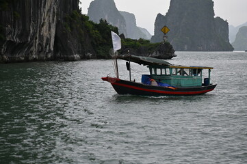 Fototapeta na wymiar Ha Long, Vietnam - November 26, 2022: The Ha Long Bay