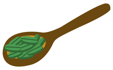 Spoon with spirulina tablets