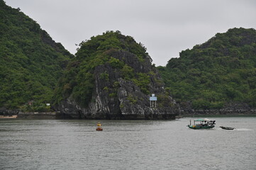 Fototapeta na wymiar Ha Long, Vietnam - November 26, 2022: The Ha Long Bay